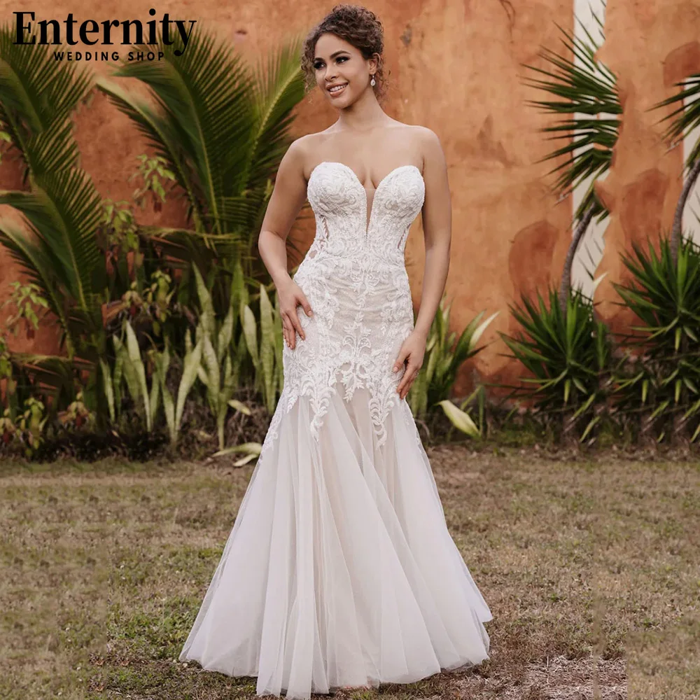 

Slinky Sweetheart Sleeveless Wedding Dresses Lace Appliques Mermaid Bridal Gowns Illusion Back Sweep Train Vestidos De Novia