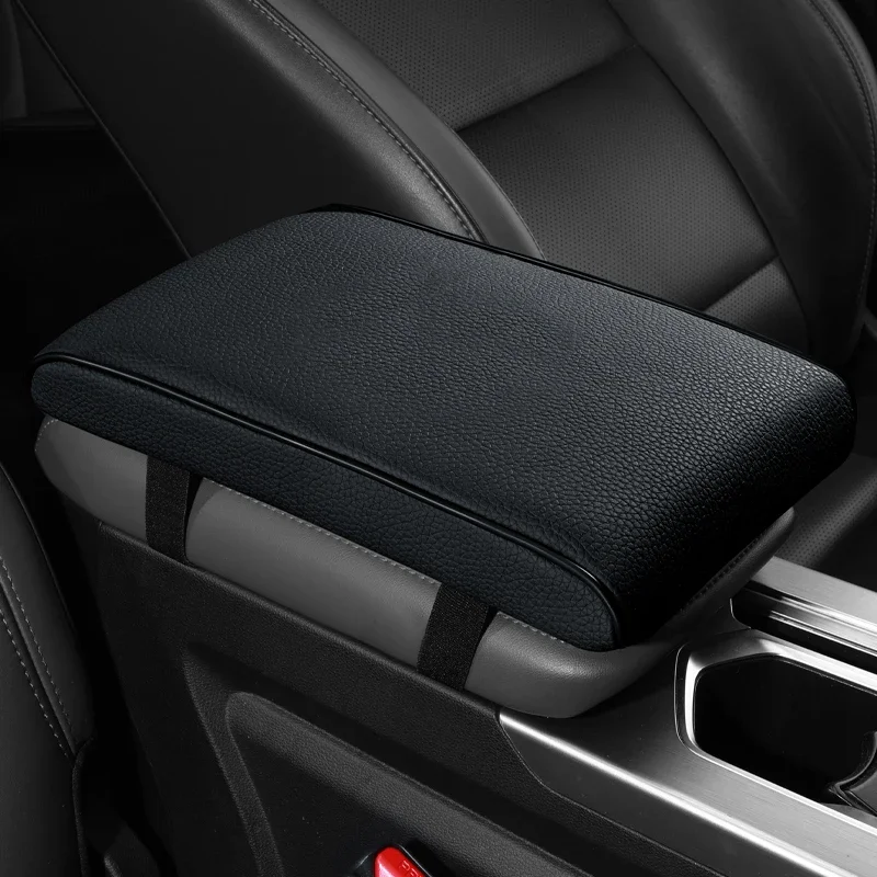 The new skin-friendly cowhide material leather memory cotton to increase the car armrest box mat advanced texture universal