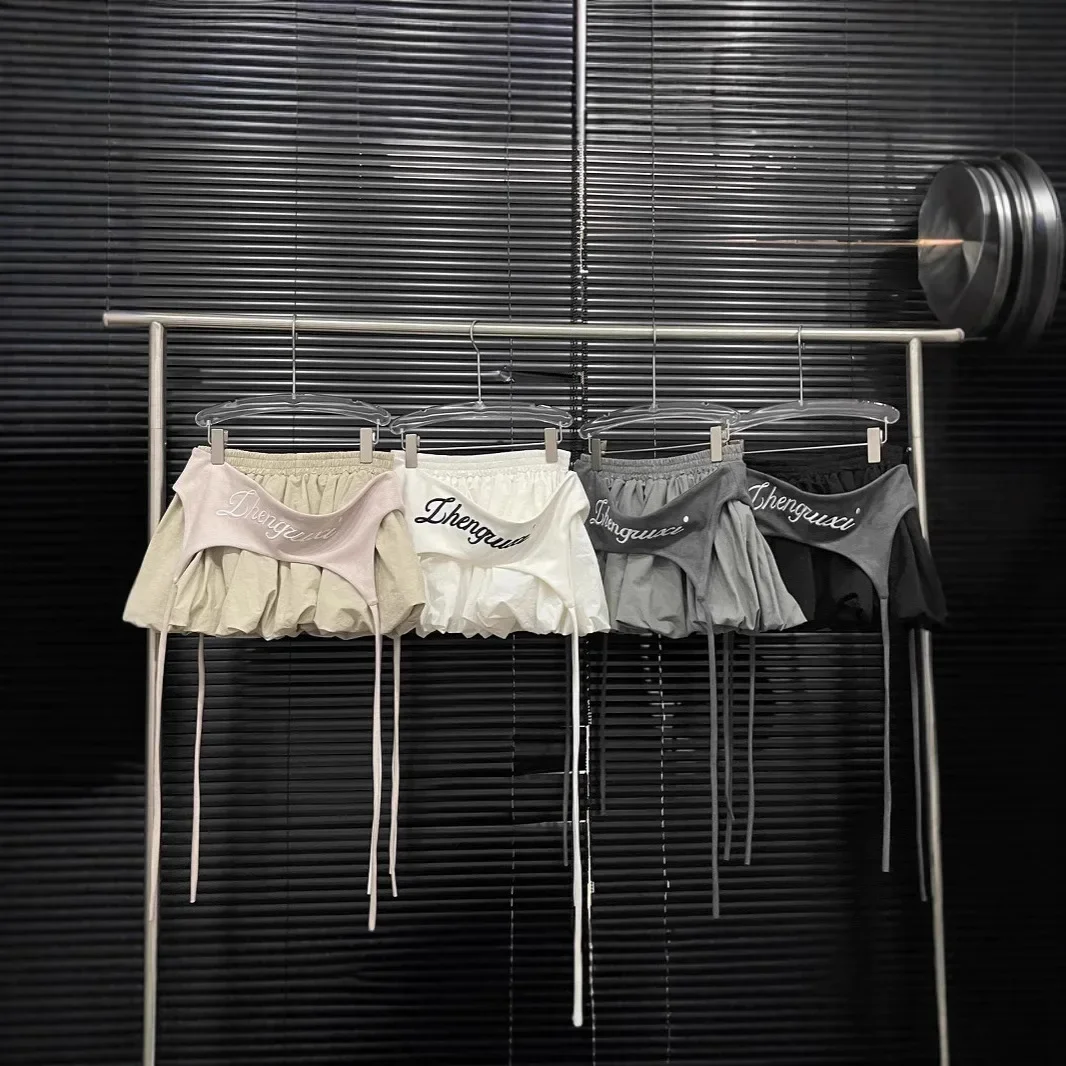 Minifalda acampanada con brotes de flores y bloques de Color para chica americana, diseño de verano para mujer, faja de empalme con capa de sentido, falda falsa de dos piezas