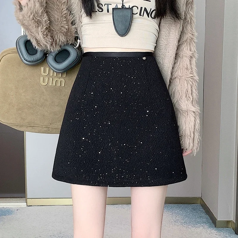 Xiaoxiangfeng Sparkling Heavy Industry sequin A-line skirt for women in winter, thick woolen half skirt, hip hugging short skirt