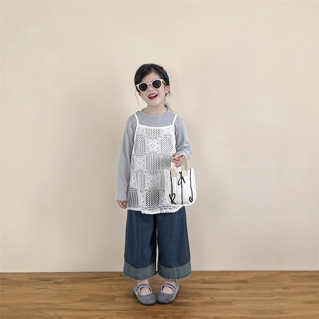 

Korean Girls' Spring and Autumn Solid Color Versatile Crew Neck Bottoming Shirt Hollow Vest Rough Edge Flanged Jeans Set
