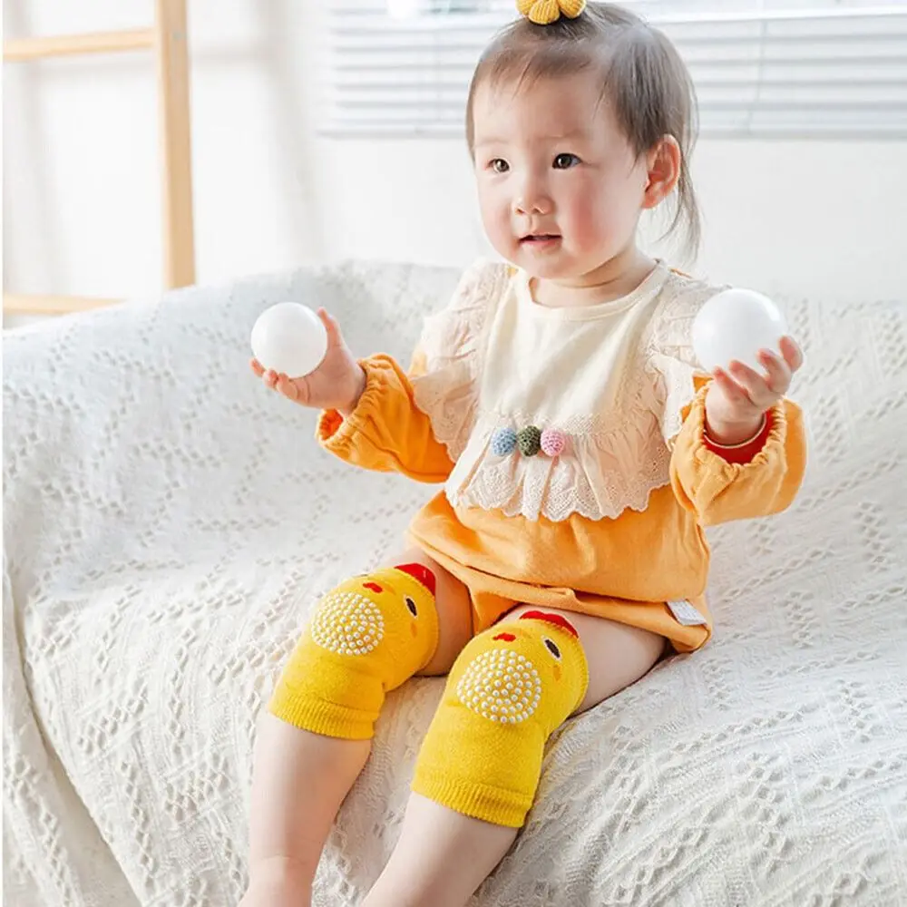 Nueva mezcla de algodón, rodillera para bebé, Protector antideslizante de dibujos animados para gatear, rodillera anticaída para bebé