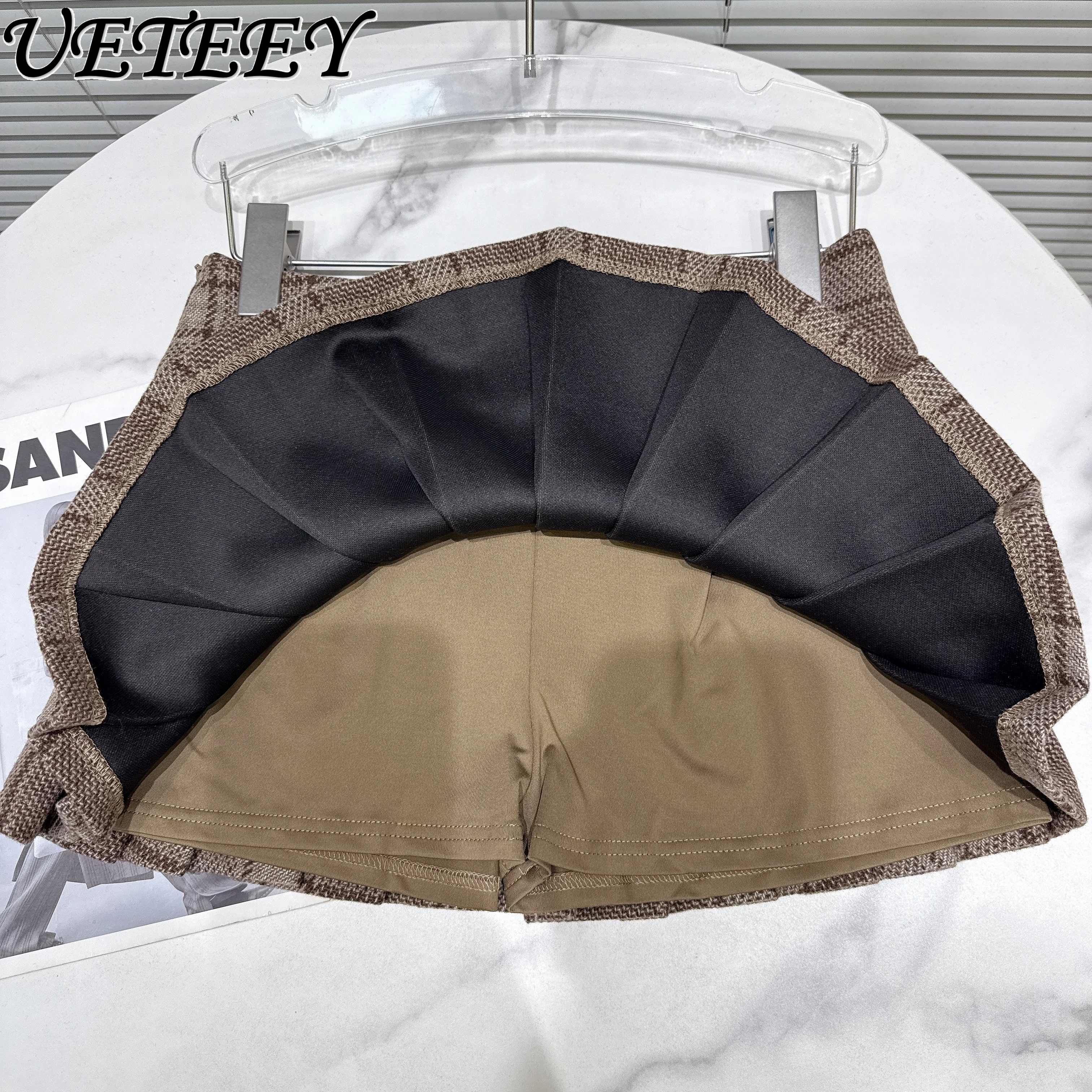 2025 خريف جديد كلية نمط الكاكي منقوشة التنانير النساء موضة المضادة للتعرض الصوفية قصيرة تنورة صغيرة مطوي تنورة للطلاب