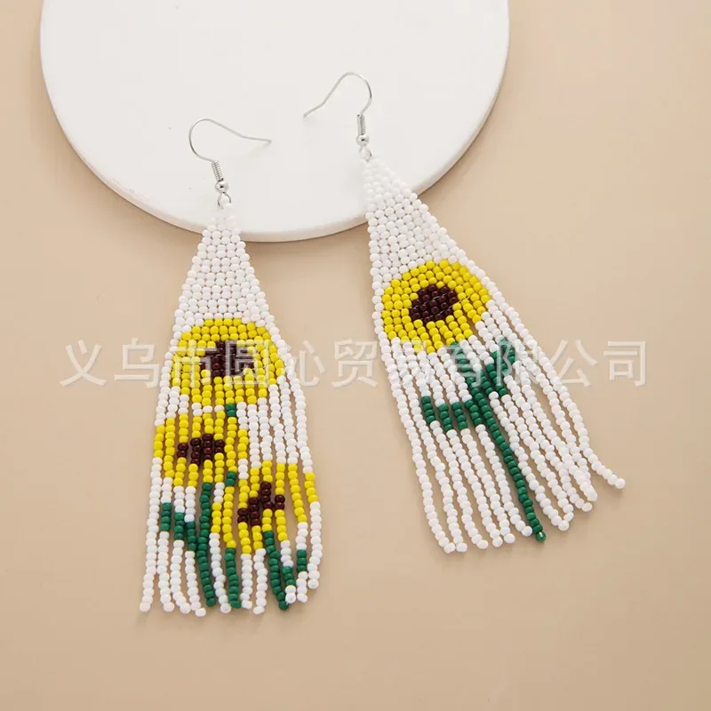 

Женские серьги из рисовых бусин в богемном стиле с кисточками ручной работы, простые универсальные украшения для ушей Jhumka из бисера