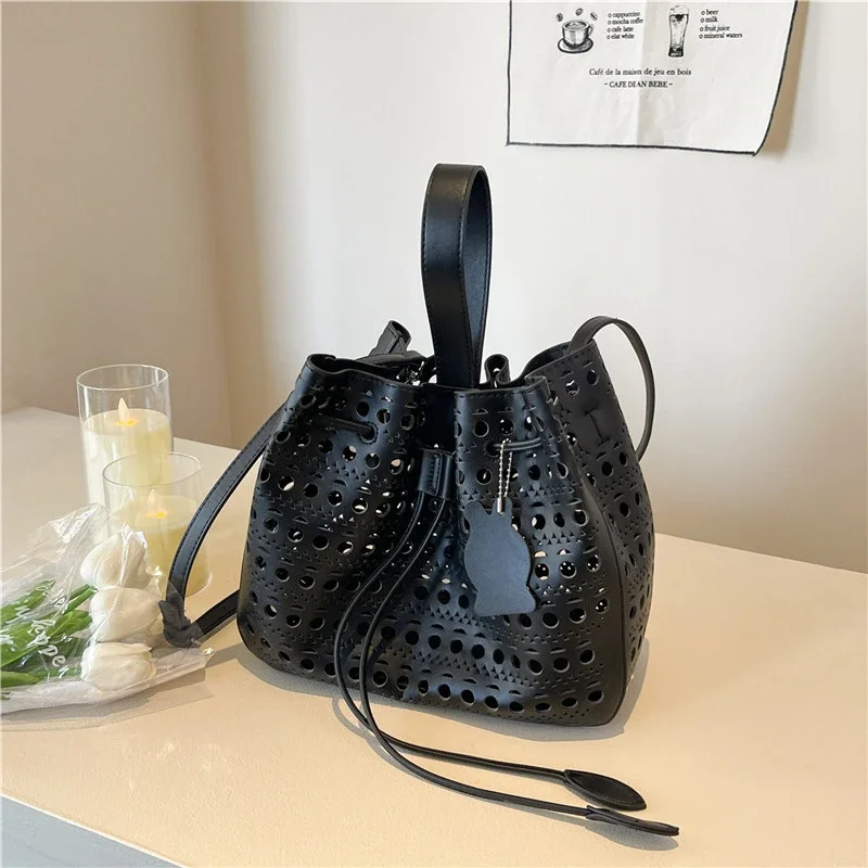 

New Super Cool Hollow Out PU Bucket Shoulder & Crossbody Bags 2026 High Quality Large Capacity Sense of Luxury Women's Handbags