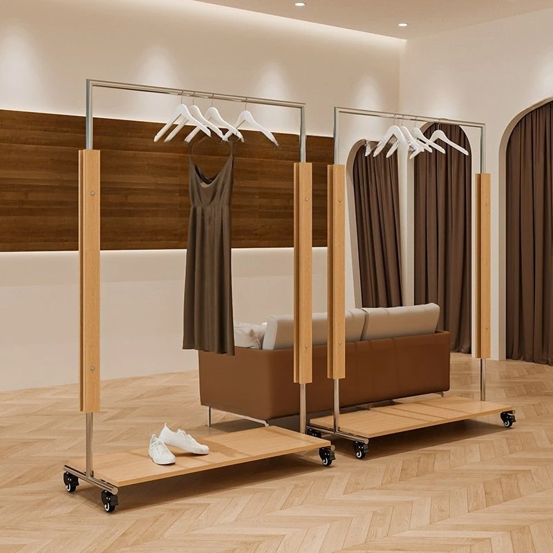 

antique hanger in floor-to-ceiling window can move walnut-colored display props in live stream.