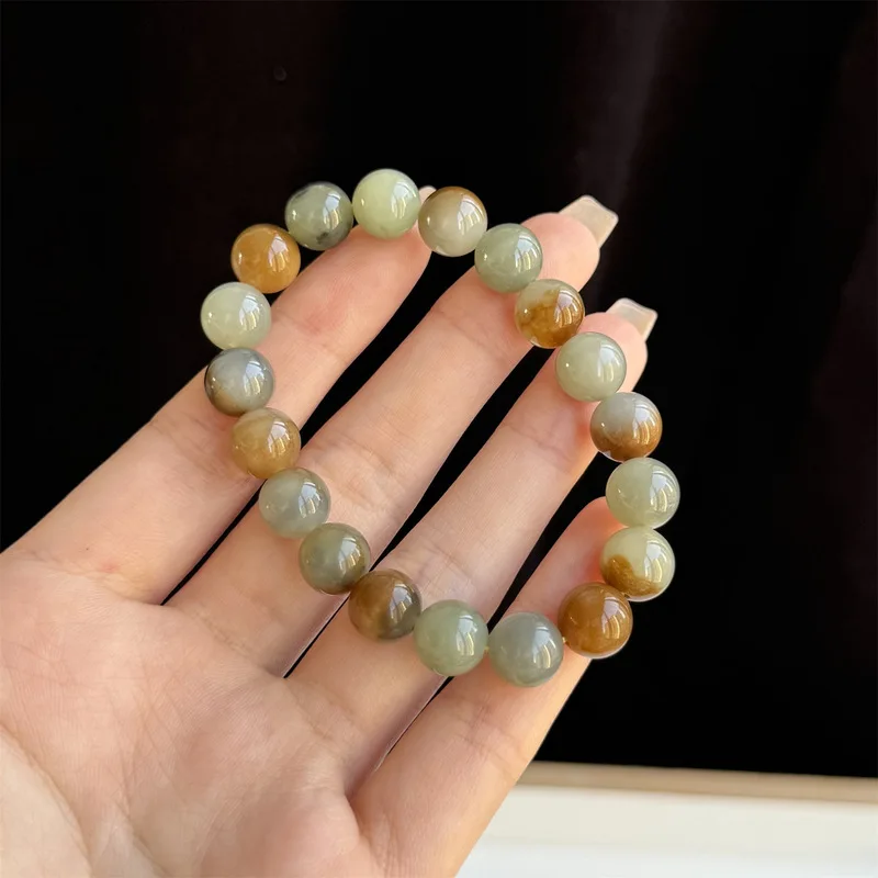 Natural Hetian Jade Loulan , Qemuo Blue Ribbon Sugar Round Bead Bracelet