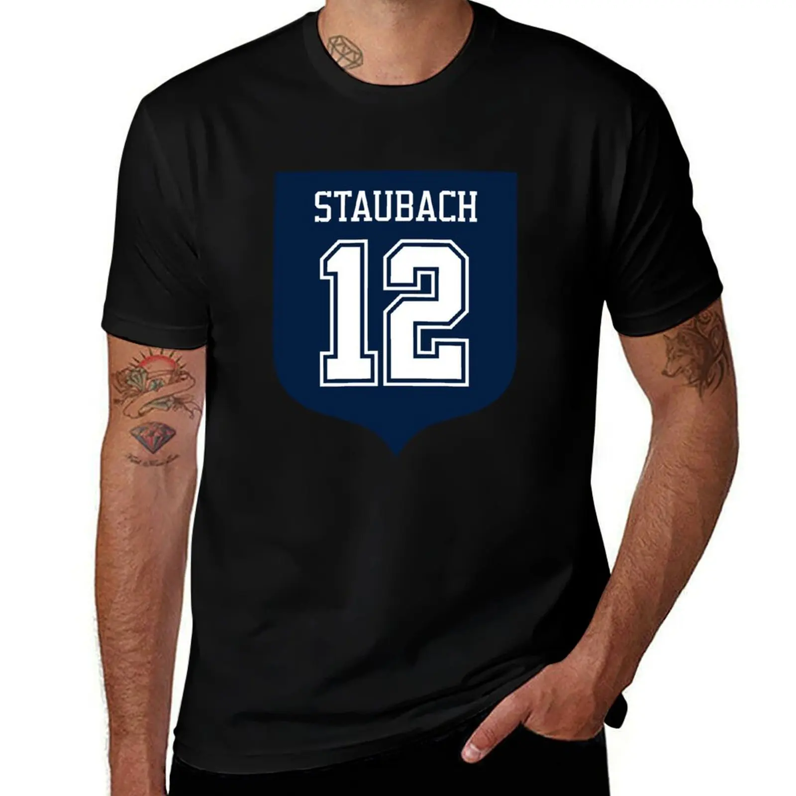 

Roger Staubach #12 emblem T-Shirt topping Funny t-shirt blacks mens cotton t shirts