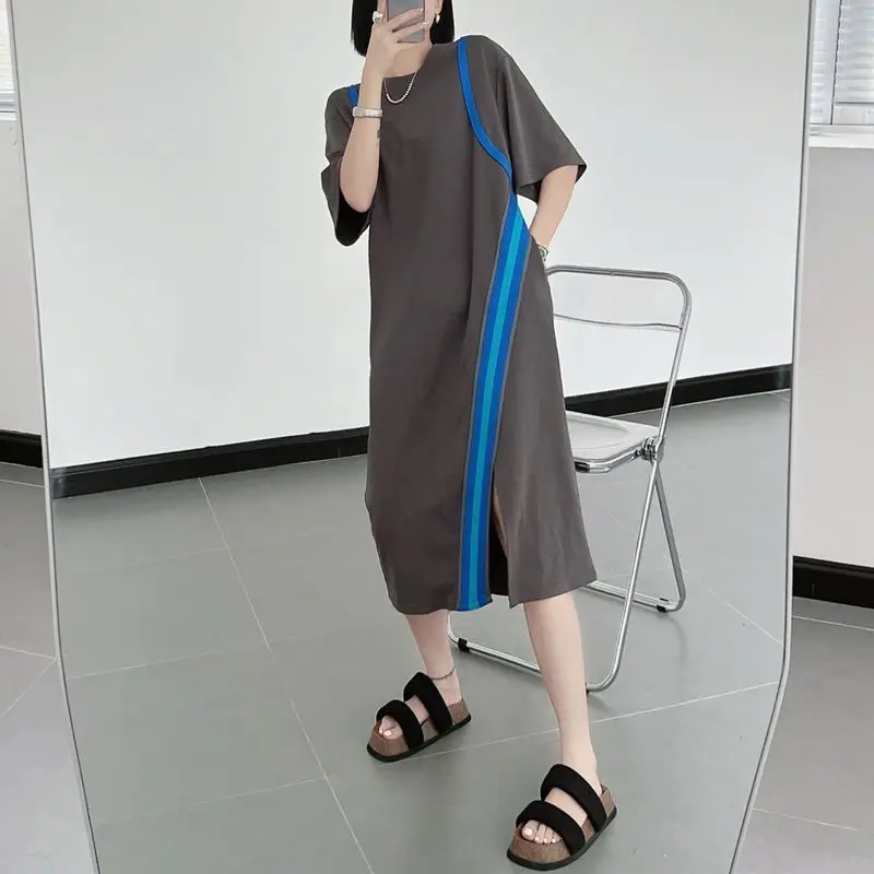 Letnia nowa okrągła dekolt z krótkim rękawem kontrastowa kolorowy Patchwork sukienka damska Oversize luźna moda asymetryczna Dresse