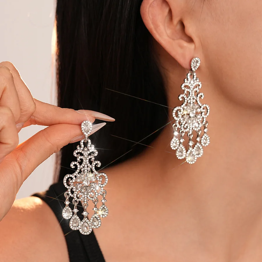 Super flash light luxury style diamond-set pattern water drop fringed silver needle earrings, niche temperament high-end women