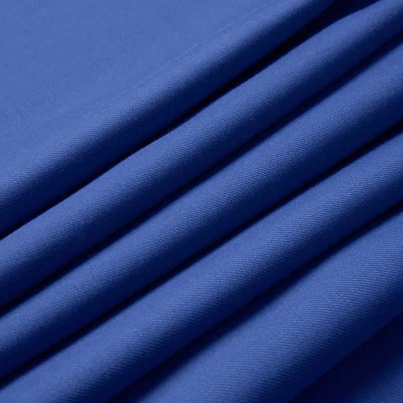 Effen kleur dubbellaags verdikte keperstof voor werkuniformen voor heren- en damespakken
