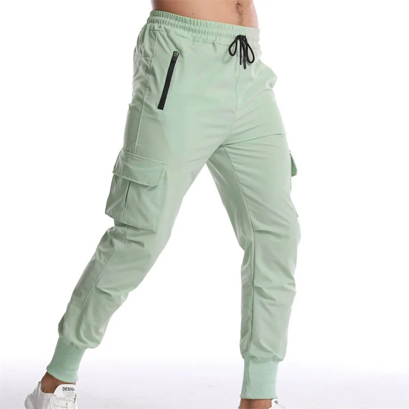 Neue gewebte Sporthose für Herren, Fitnesshose mit mehreren Taschen, dünn, locker, schnell trocknend, dehnbar, Jogginghose, Lauftrainingshose