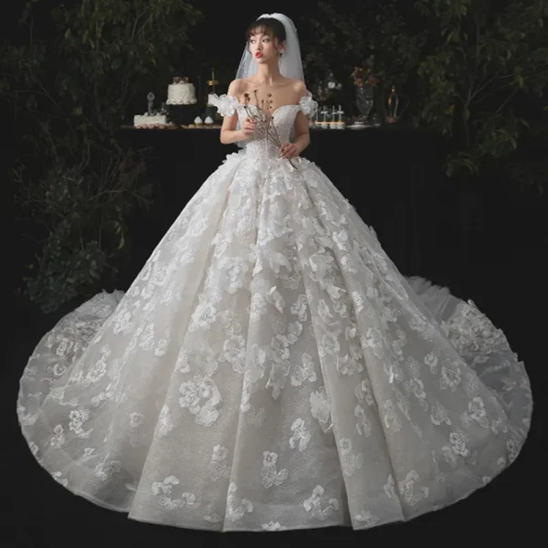 

Customized Women's White Wedding Dress With Off Shoulder Pearl Sequin Lace And A Romantic And Gorgeous Back Strap Design