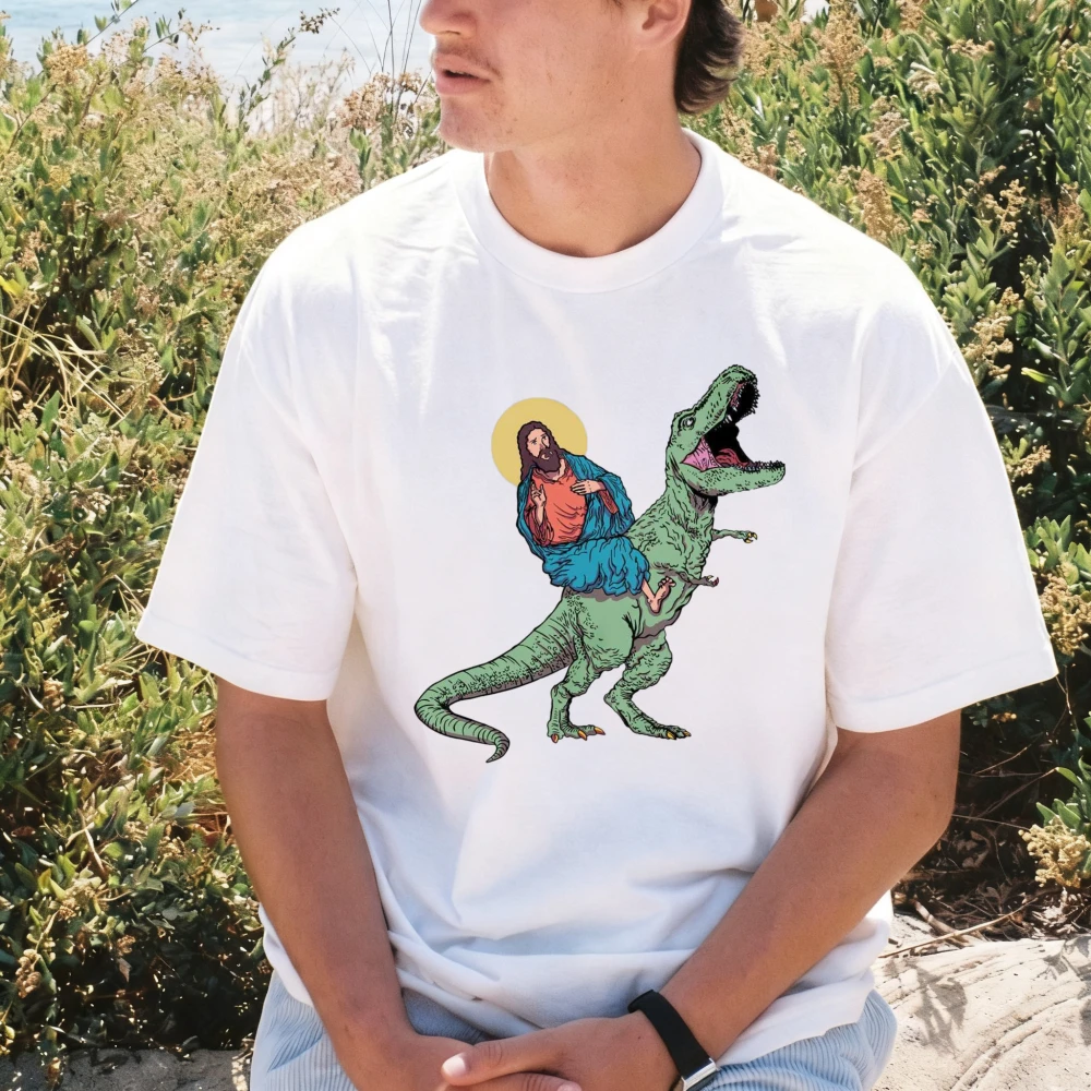 Funny Jesus Riding T-Rex Caroon Graphic Printed Classics TShirt Retro Christian Religion Faith T-shirt Summer Cotton Unisex Tees