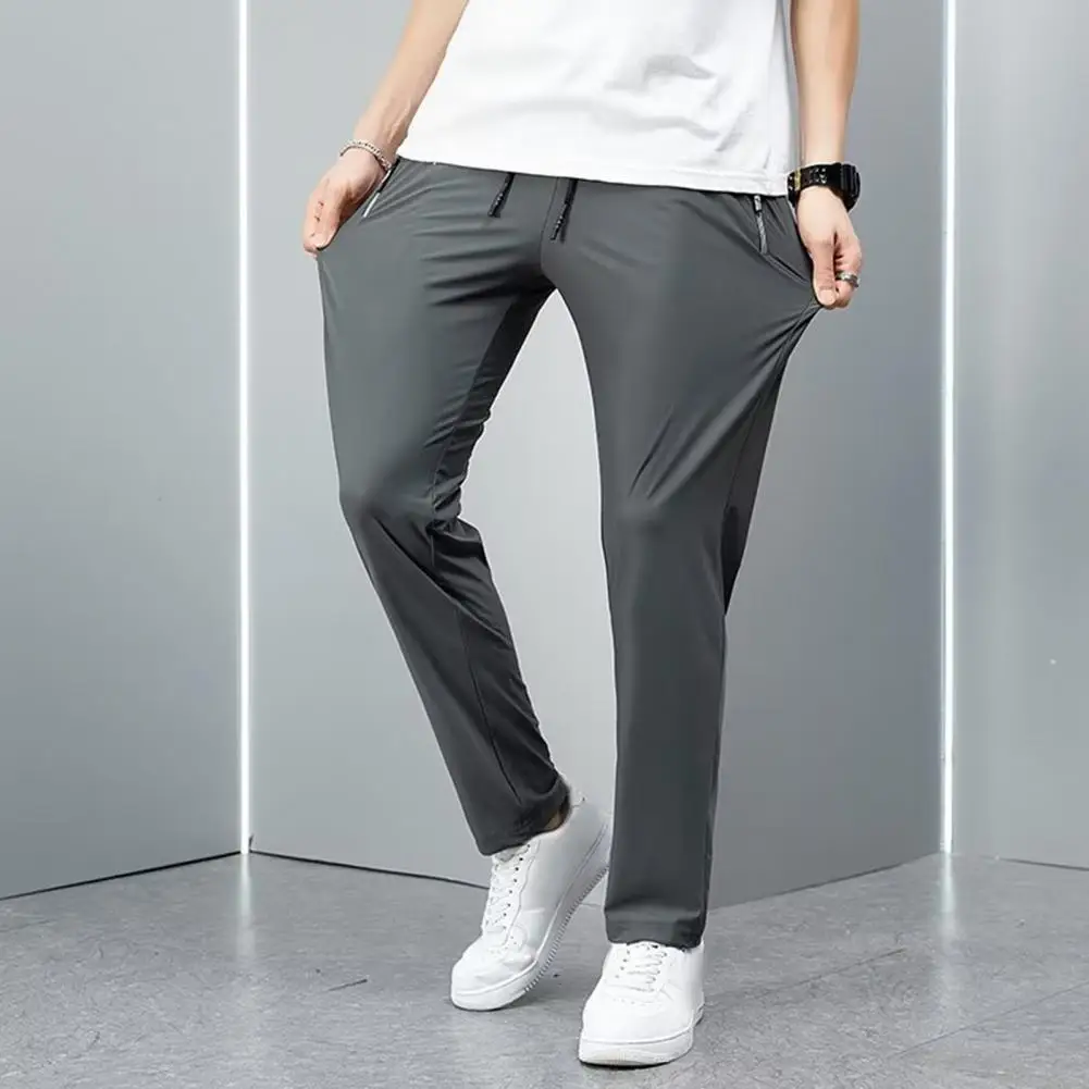 

Solid Color Sweatpants Men's Loose Straight Drawstring Pants with Elastic Waist Pockets Breathable Ankle Length for Daily