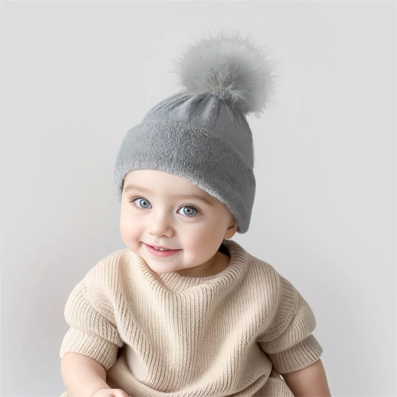 

Blotona Newborn Autumn Winter Beanies with Fur Ball Soft Cozy Thin Solid Color Baby Knit Hats Infant Caps