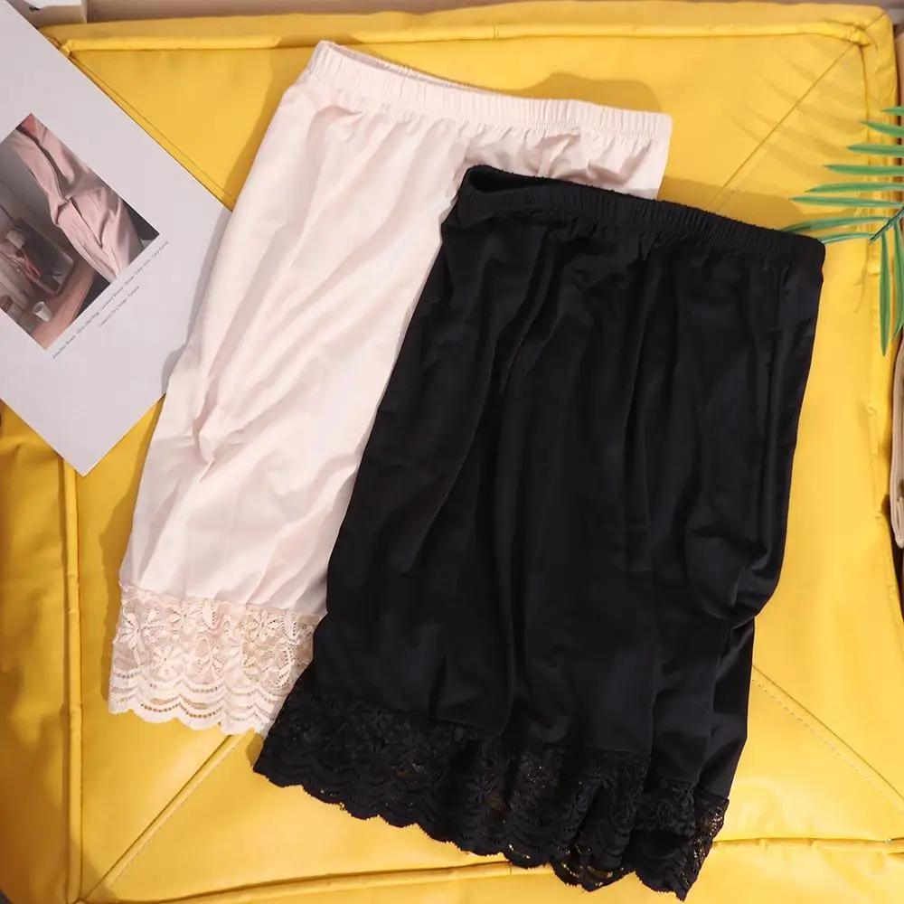 กระโปรงซับในผู้หญิงแบบลูกไม้ลายดอกไม้ ความยาวครึ่งตัว สีพื้น ทรงหลวม