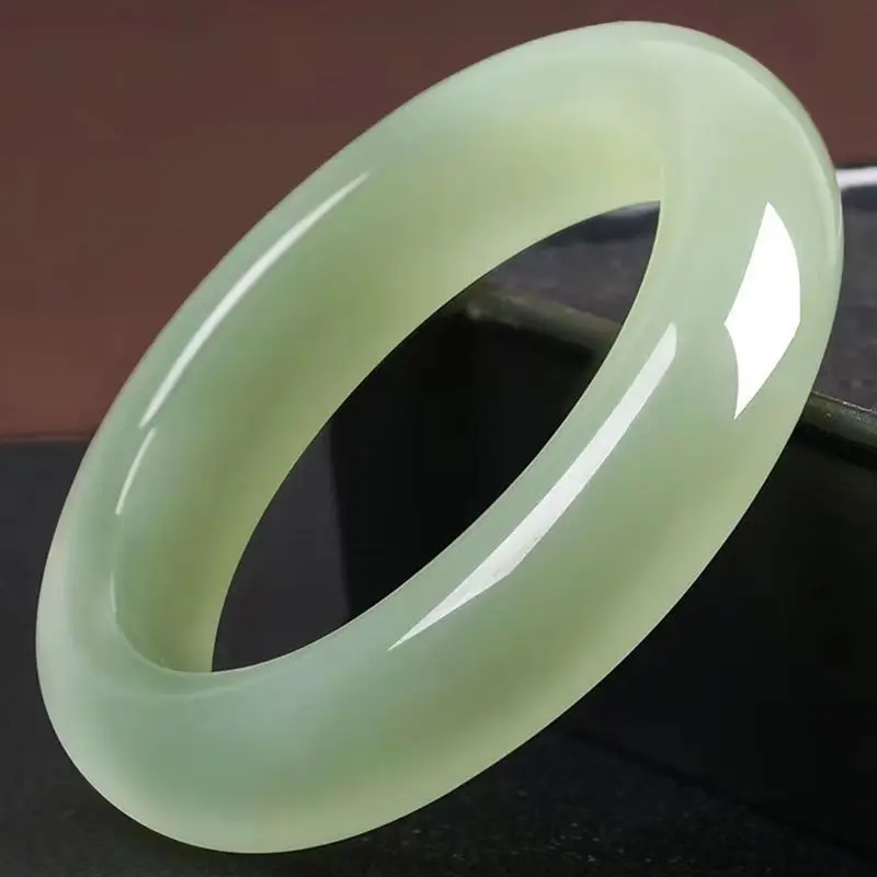 Medium-width round Hetian green and white jade bracelet for women genuine natural product featuring a smooth