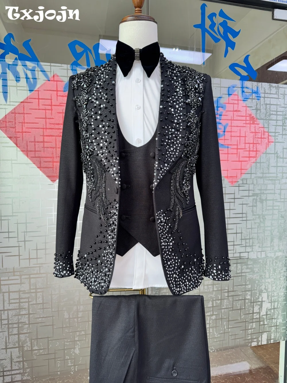 

Dazzling Black 3 Piece Men Tuxedo Suit 2026 Crystal Beaded Embellished Formal Suit For Groom Prom Singer Performance Red Carpet