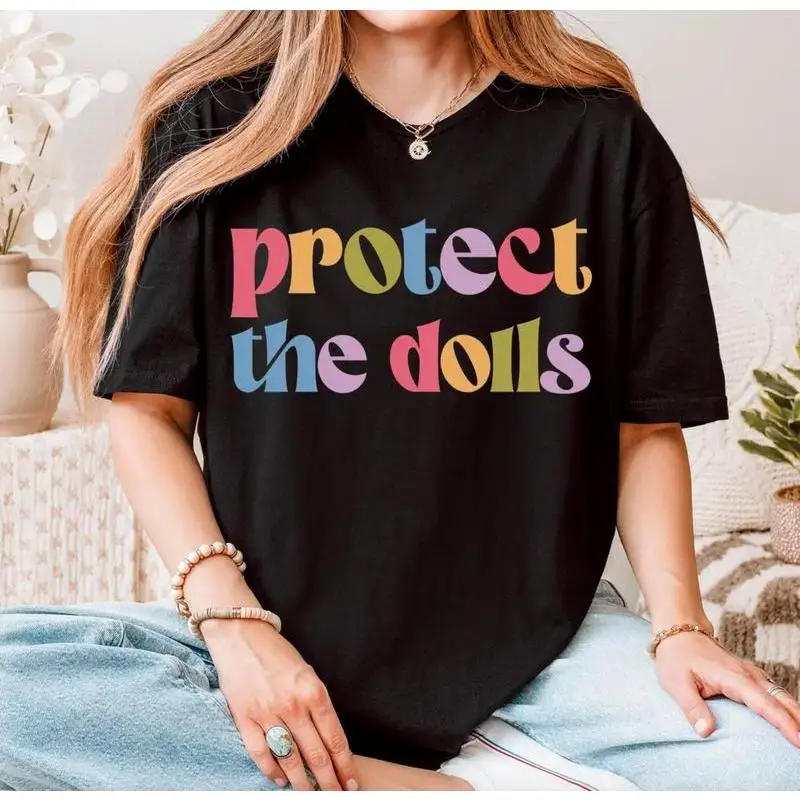 

Women's "Protect The Dolls" T-Shirt | Empowering Feminism Graphic Tee | Retro Rainbow Rights Advocate Gift Top