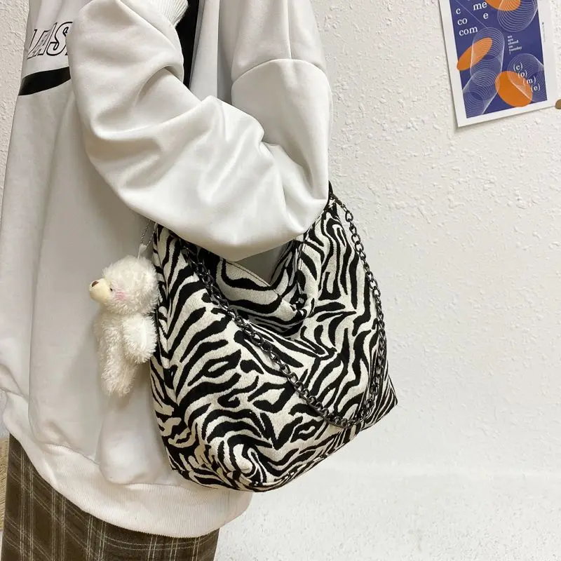 Bolso de lona estampado para mujer, bolsa de mano portátil de gran capacidad, combina con todo, nueva moda, 2023