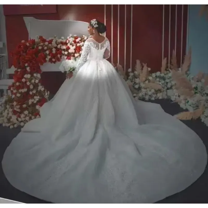

Customized New Wedding Dress African Bride Lace Hollow Long Sleeve Wedding Dress 100cm Tail Customize Dress