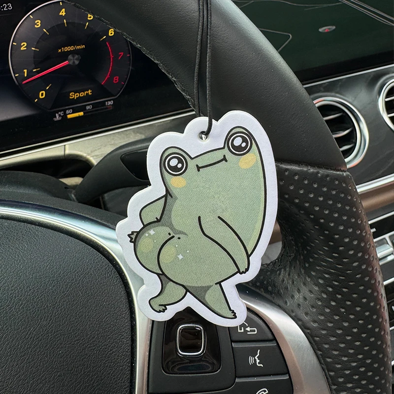 Dancing Frog Design Hilton (Hotel Scent) Car Air Freshener |   Rearview Mirror Hanger & Dual-Purpose Air Vent Clip |   Natural Material Aromatherapy Tablets |   Long-Lasting Fragrance for 90 Days |   Alcohol-Free |   Not Afraid of the Sun Exposure |   Designed Specifically for Odor Removal in Cars, Closets, and Bathrooms. |   Cartoon Animation Graphics |   Unisex |   Luxury-Grade Fragrance |   The Same Ocean-Themed Design as Five-Star Hotels