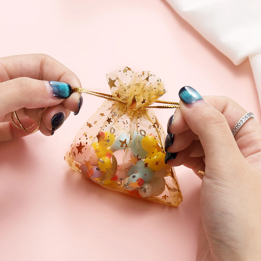 10 unids/lote, bolsa de Organza navideña con estampado de estrellas y Luna de varios tamaños, bolsas de embalaje con dijes con cordón, paquete de joyería diaria