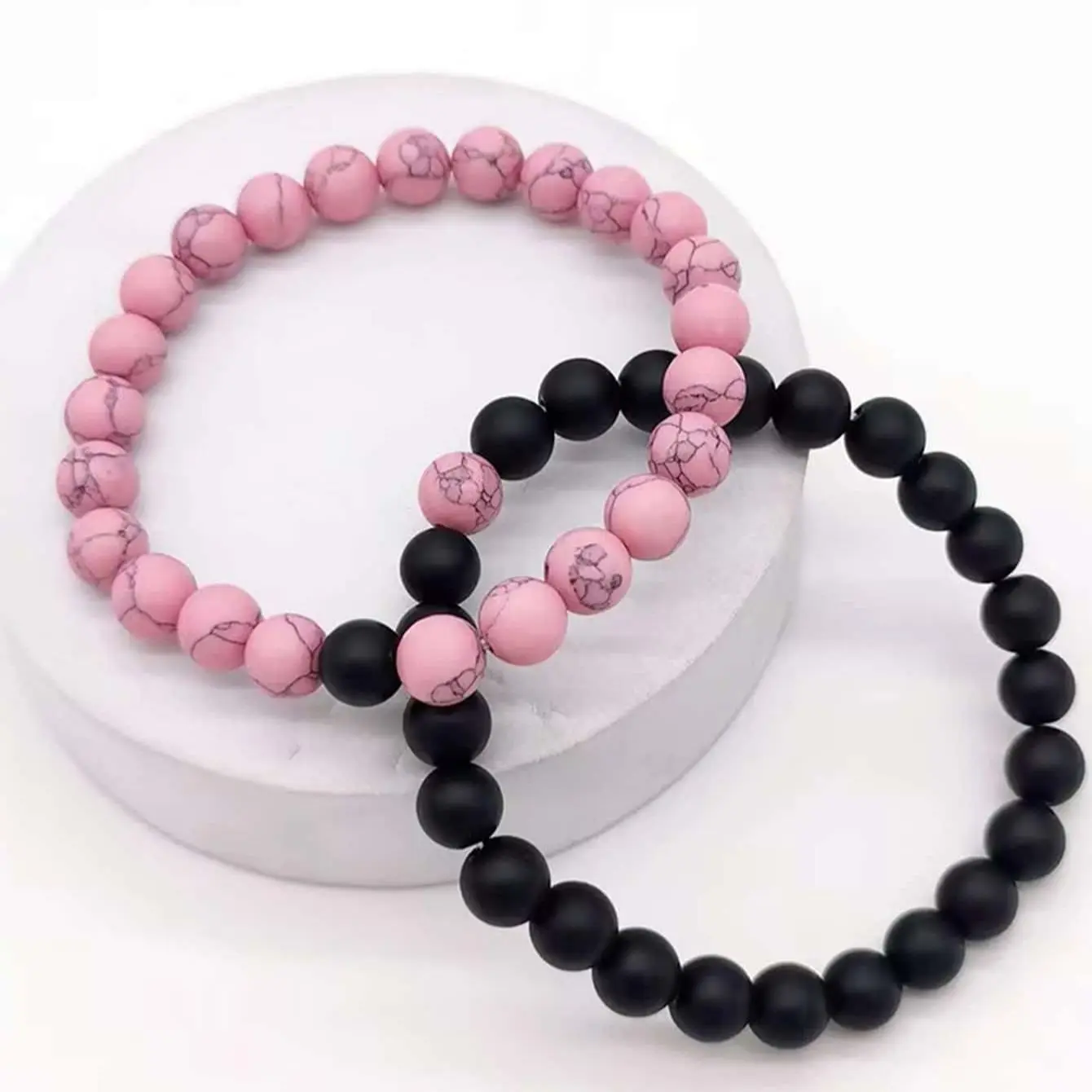 2 pairs of pink beads with black beads bracelet set