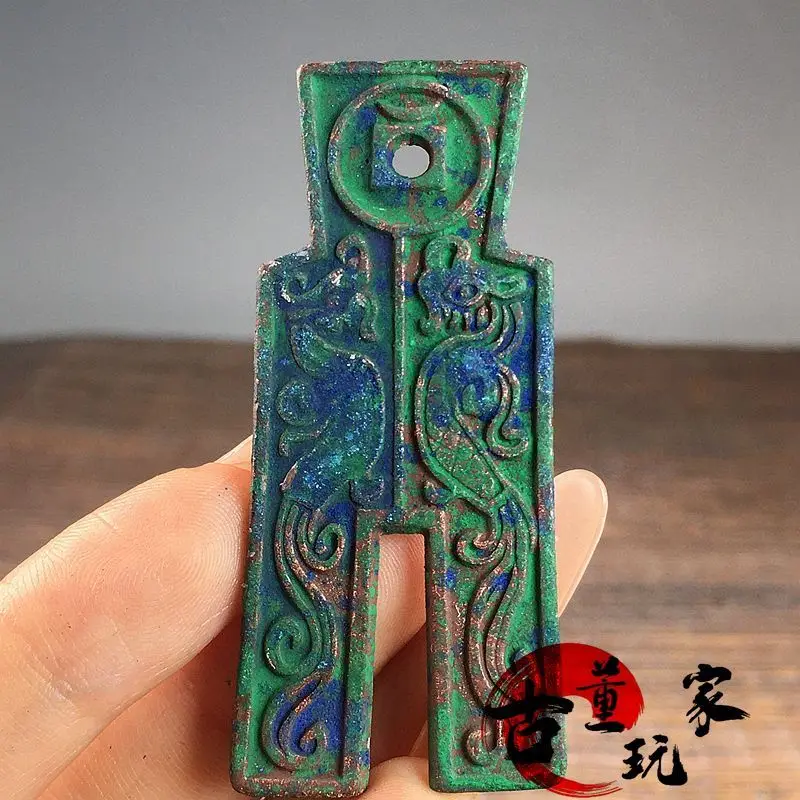 Green rust pulp Western Han Dynasty Wang Mang Xinmang currency ancient coin red spot green embroidery cloth