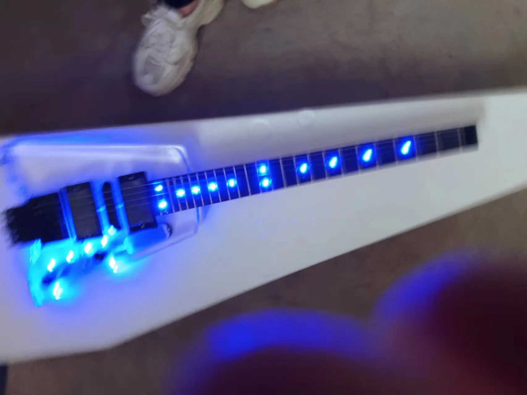 Acrylic headless electric guitar with blue light, rosewood fretboard, high quality and customizable, free shipping