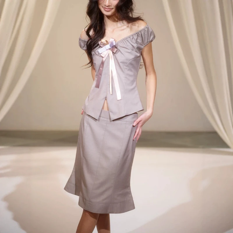 2026 Summer New Niche Design V-neck One Shoulder Cinched Waist Suit Bubble Sleeve Top Fishtail Skirt Half Skirt Set for Women