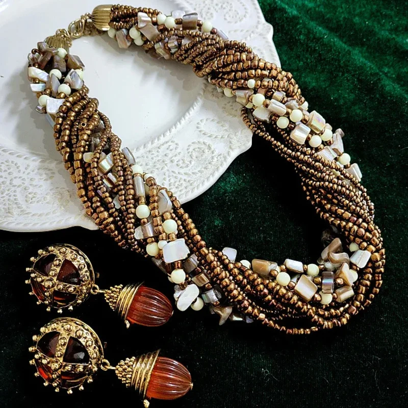 

Vintage heavy heavy caramel colored glass beads shell multi-layer rice beads necklace tassel earrings girl