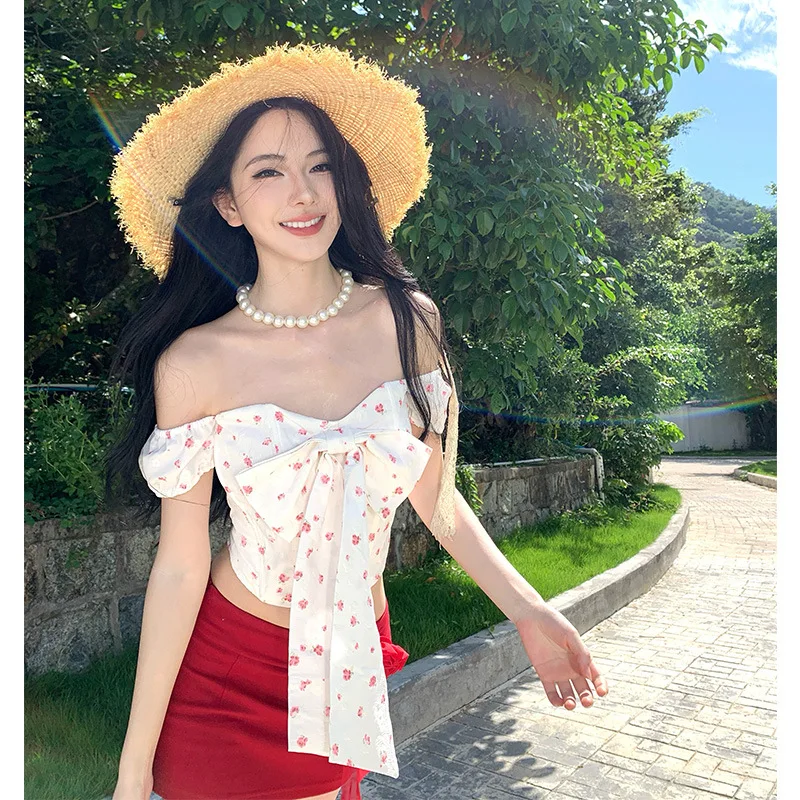 2026 Vacation Style Summer New Hot Selling One Shoulder Small Floral Bow Top and Red Short Skirt Two-piece Set