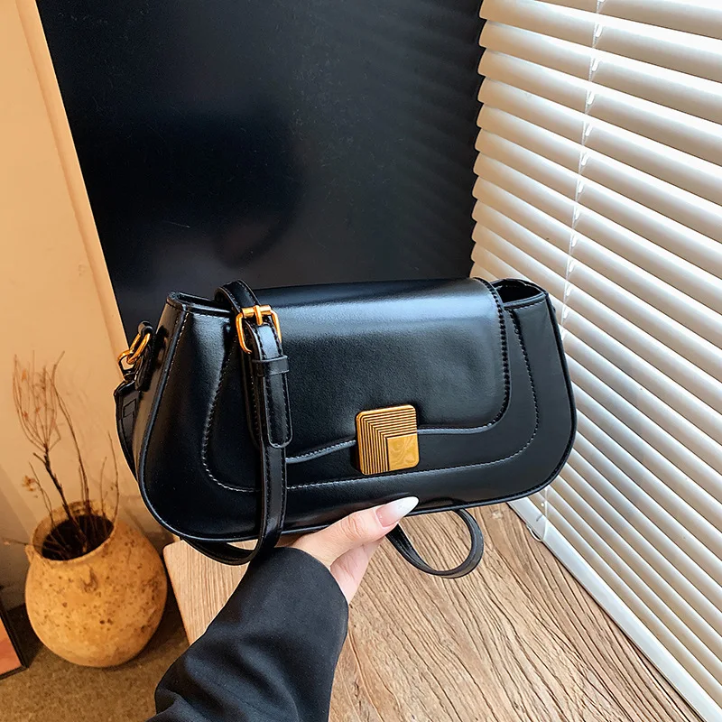Fashion design versatile temperament shoulder messenger bag foreign style women's bag solid color retro lock armpit bag