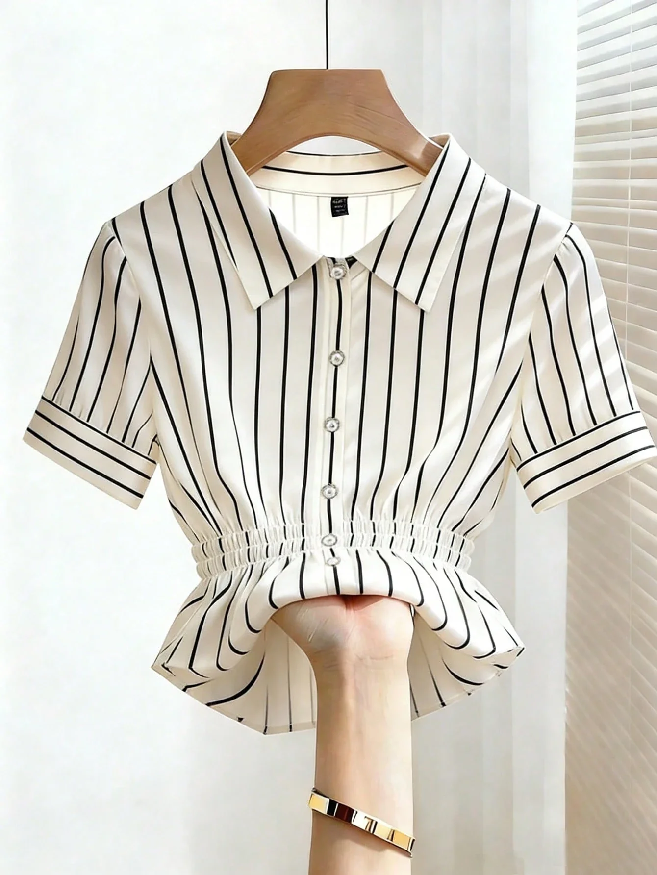 

Elegant Striped Pearl Button Short Sleeve Blouse With Ruffle Hem And Cinched Waist