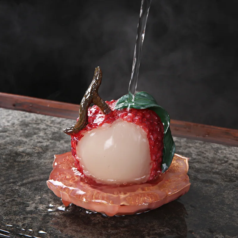 Lychee color-changing tea pet, a variety of fruits poured with hot water color-changing tea set decorative ornaments