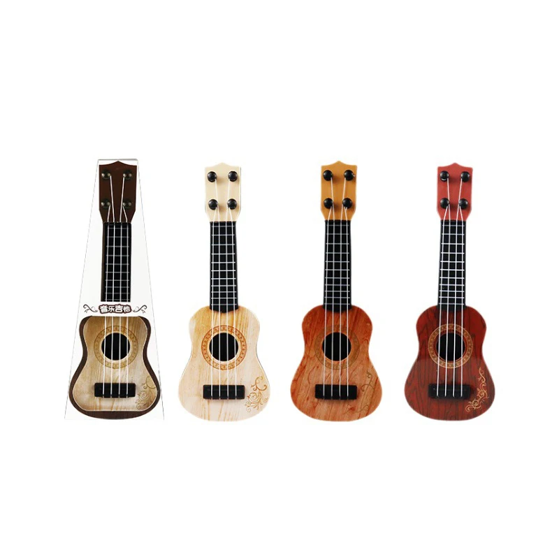 เด็กปริศนาของเล่นเครื่องดนตรีจําลองกีตาร์ Ukulele MINI สี่สายสามารถเล่นการศึกษาของเล่นของขวัญวันเกิด