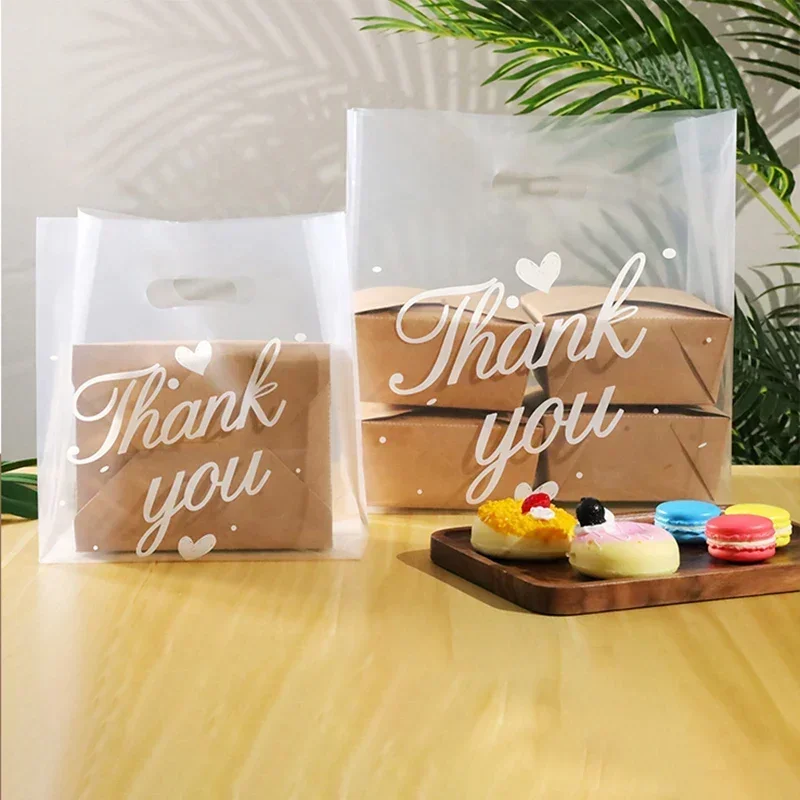 

50pcs 24x33x14cm Plastic Gift Bags Transparent Retail Shopping Bags Candy Cake Wrapping Bags Christmas Gift Packaging Supplies