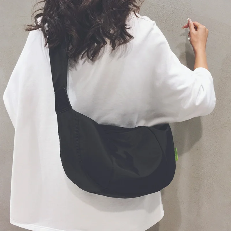 

Fashionable and Minimalist Canvas Bag for Women Lightweight Travel Leisure Versatile Sports Fitness Crossbody Dumpling Bag