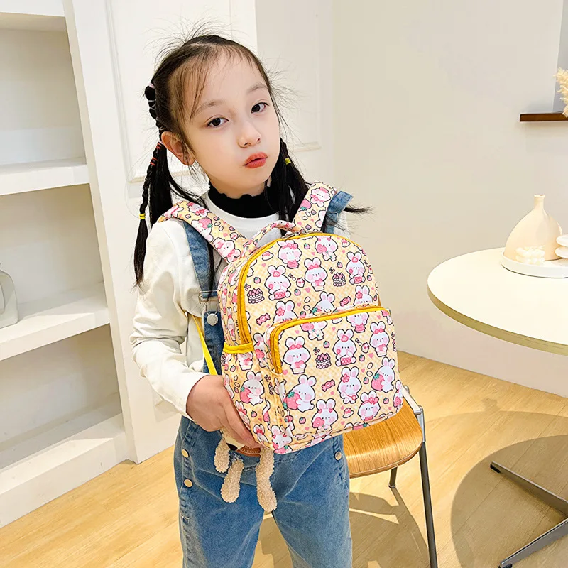 2023 neue Kinder rucksack Cartoon drucken niedlichen Kaninchen Mädchen Student Rucksack Mode Freizeit Junge Dinosaurier Kindergarten Schult asche