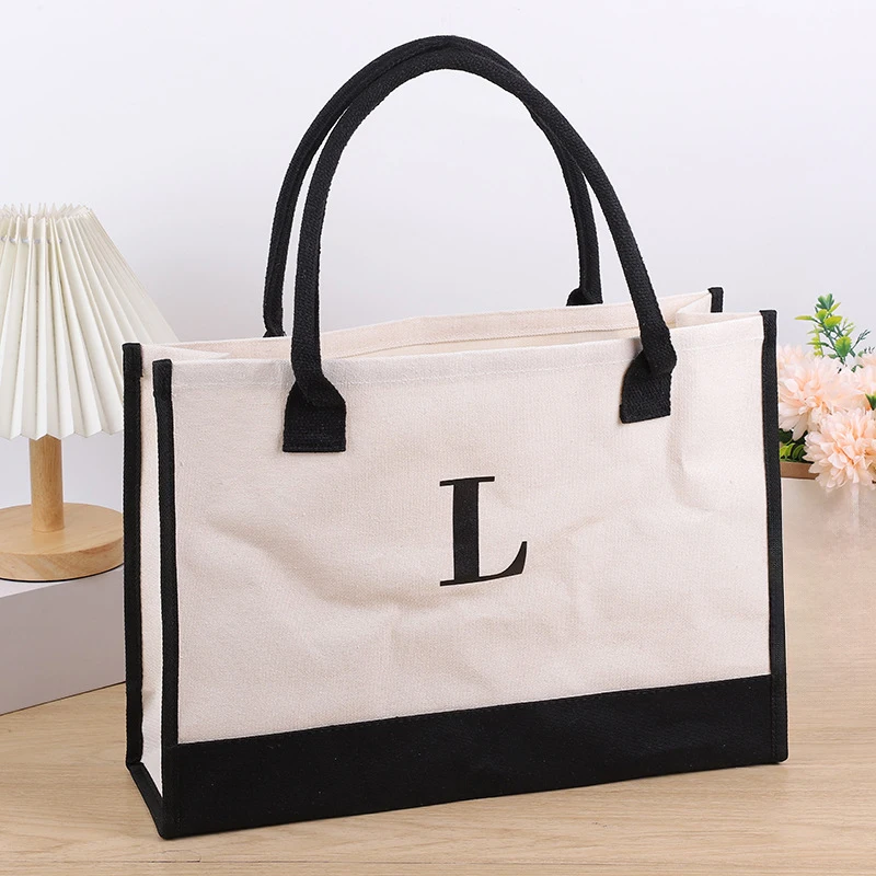 Letter hot stamping letter printed women's handbag, with a large capacity waterproof leisure commuter bag inside