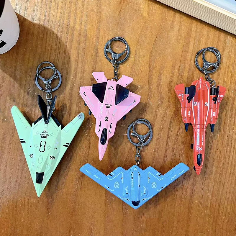 Mini avión de aleación creativa/juguete de combate, llavero modelo para niños, regalo de luchador para niños, colgante de avión pequeño de inercia
