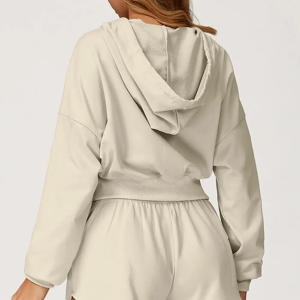 

Зимний комплект для йоги: удлиненная толстовка с капюшоном на молнии и стильные брюки для женщин среднего возраста, идеально подходящий для зимнего сезона.