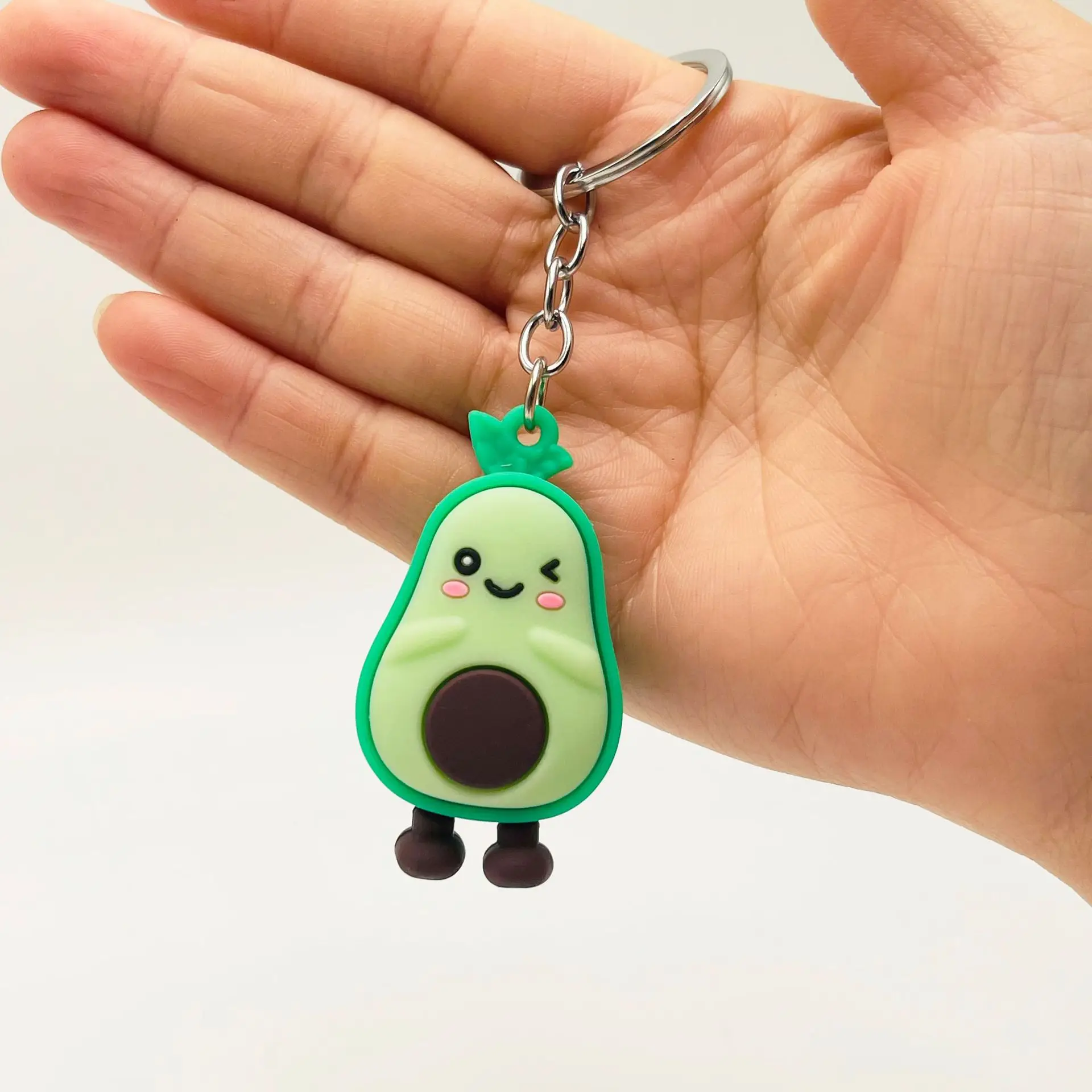 Creative cartoon avocado key chain pendant smiling face avocado soft plastic pendant bag pendant activities gifts