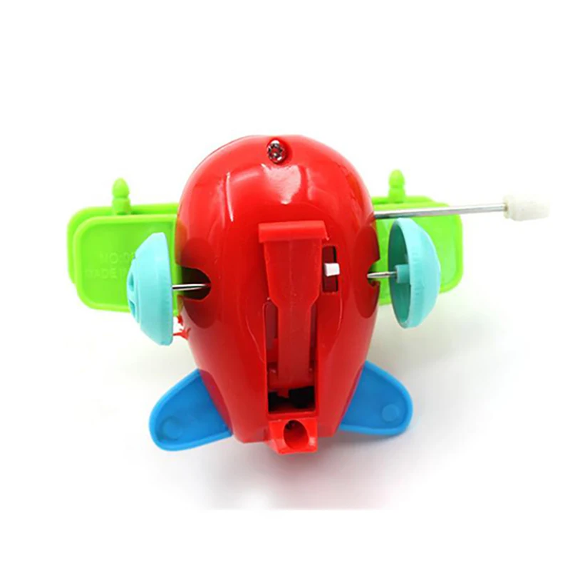 Juguetes creativos de cuerda giratoria para niños, juguete de cuerda de dibujos animados, avión pequeño de dibujos animados, regalo