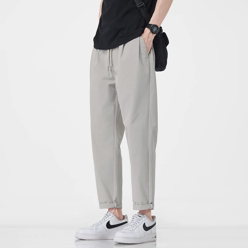 

Летние универсальные повседневные зауженные укороченные брюки из ледяного шелка на шнурке