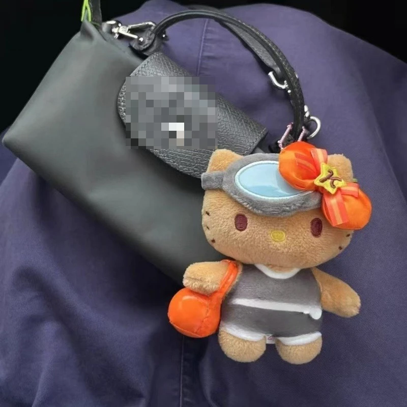 พวงกุญแจตุ๊กตาการ์ตูนซานริโอ้ใหม่ ตุ๊กตาขนนุ่มสีดำ Hello Kitty ตุ๊กตาขนนุ่มเจจูแว่นตาสีส้มโบว์สีส้ม KT cat อุปกรณ์เสริมกระเป๋า