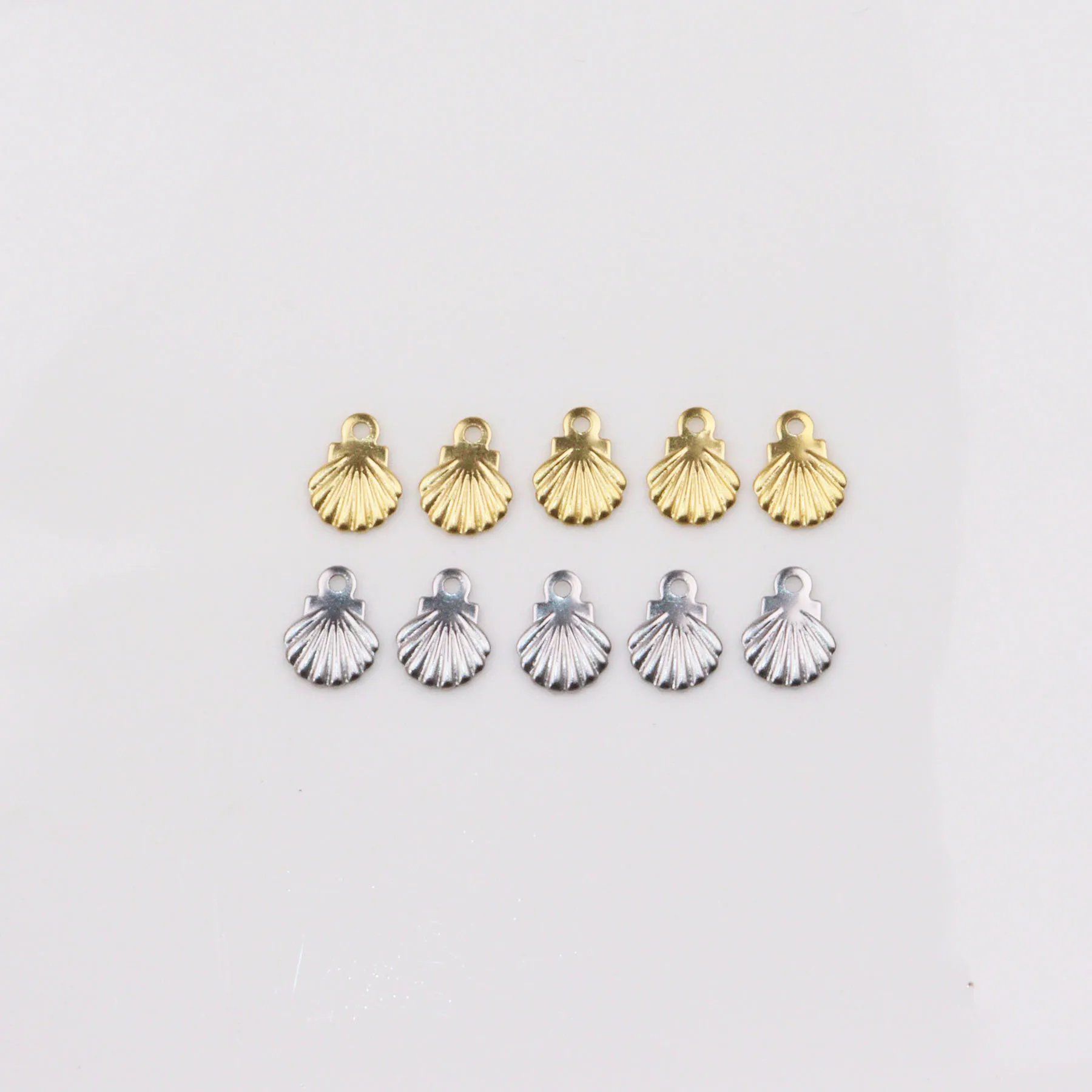 100/20 sztuk 6mm hurtownia ze stali nierdzewnej Mini muszla zwisające Charms DIY obrączki kolczyki bransoletki nieblaknące bezbarwne 2 kolory