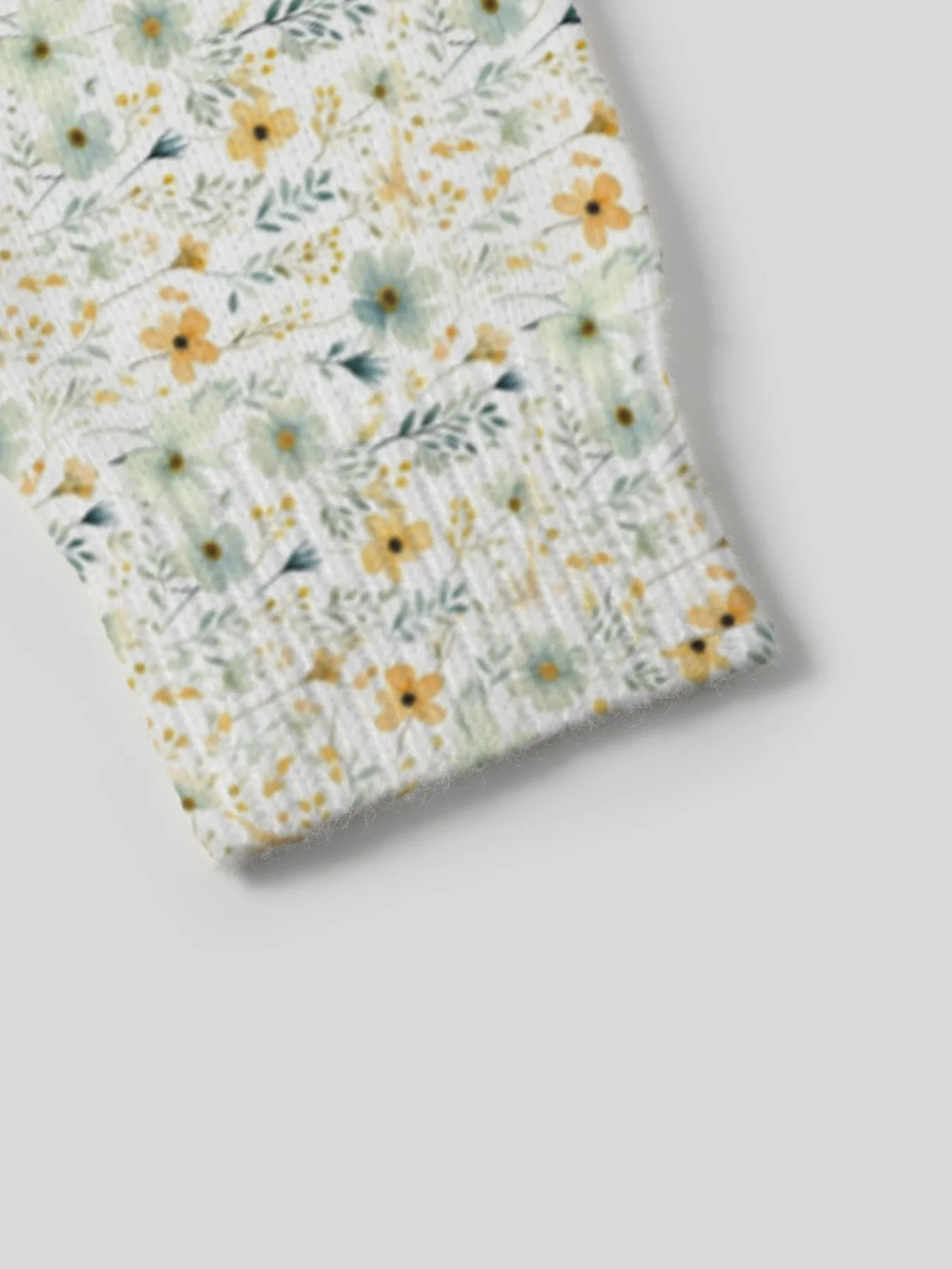 Um cardigã feminino estampado com um estilo elegante e simples de suéter de malha flor e grama, gola redonda casual e formal nós
